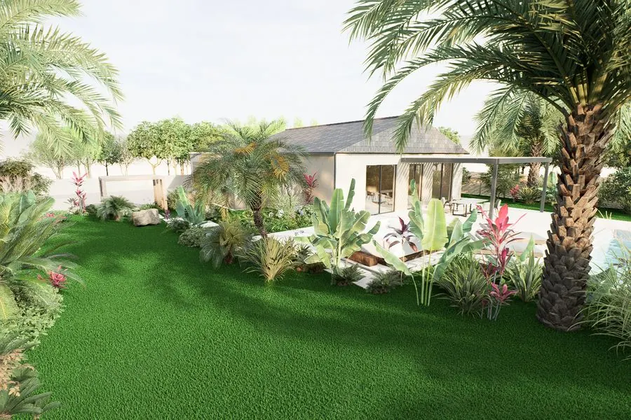 Le grand jardin, palmiers et massifs, maison au fond